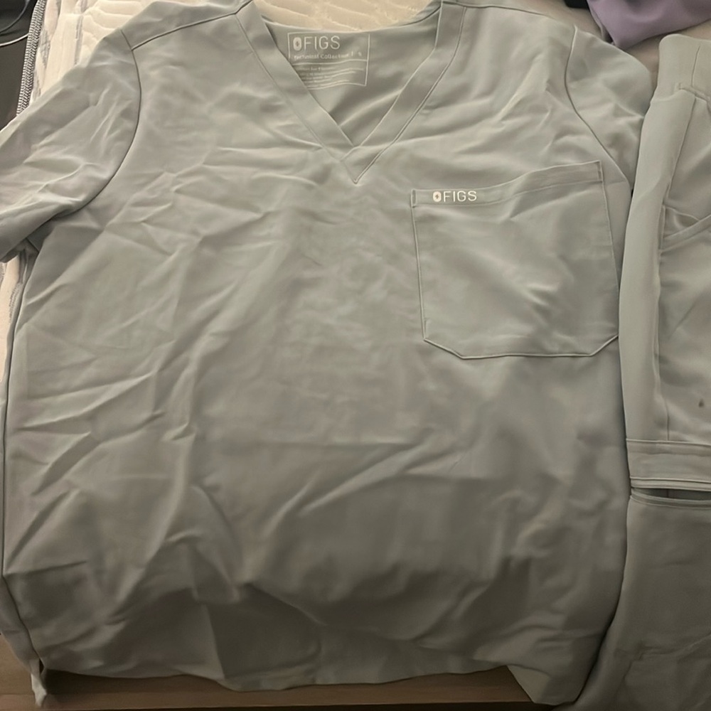 Sliver scrubs with neon detail .